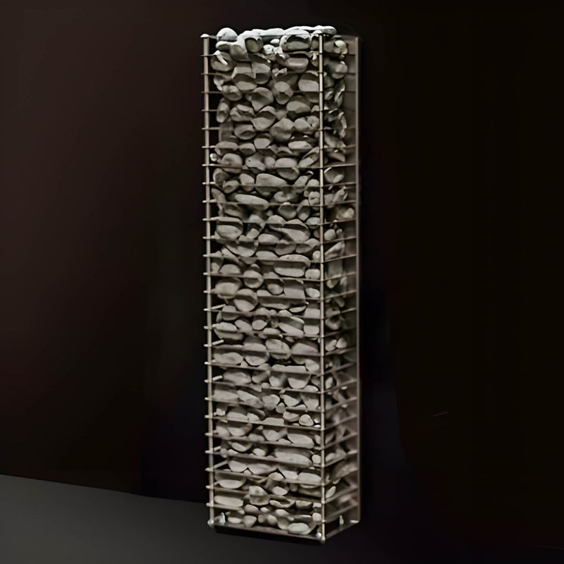 Tall rectangular sauna heater filled with stones on a black background