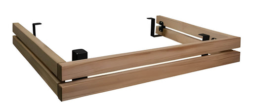 Wooden sauna heater safety rail with metal brackets on a white background