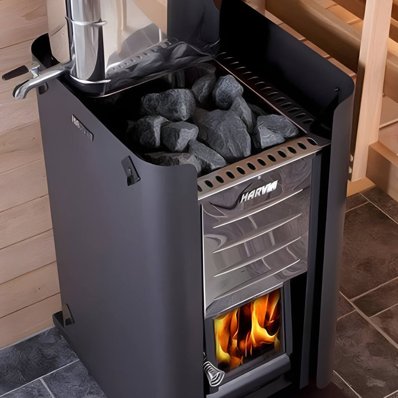 Black sauna heater with visible flames and rocks inside, set against a wooden interior background.