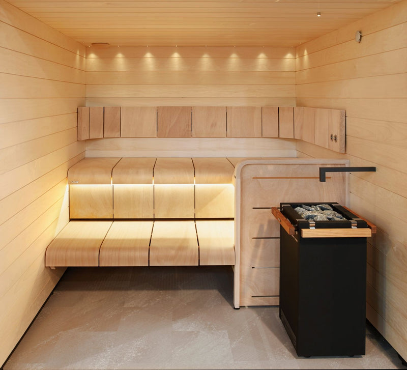 Wooden sauna interior with sauna heater