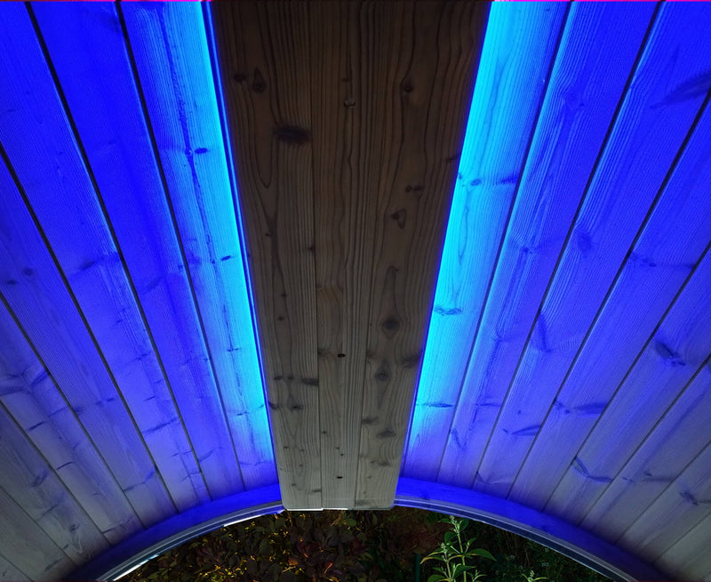 Wooden structure with blue LED lights on a wooden floor