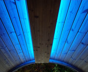 Wooden ceiling with blue LED lighting on the sides