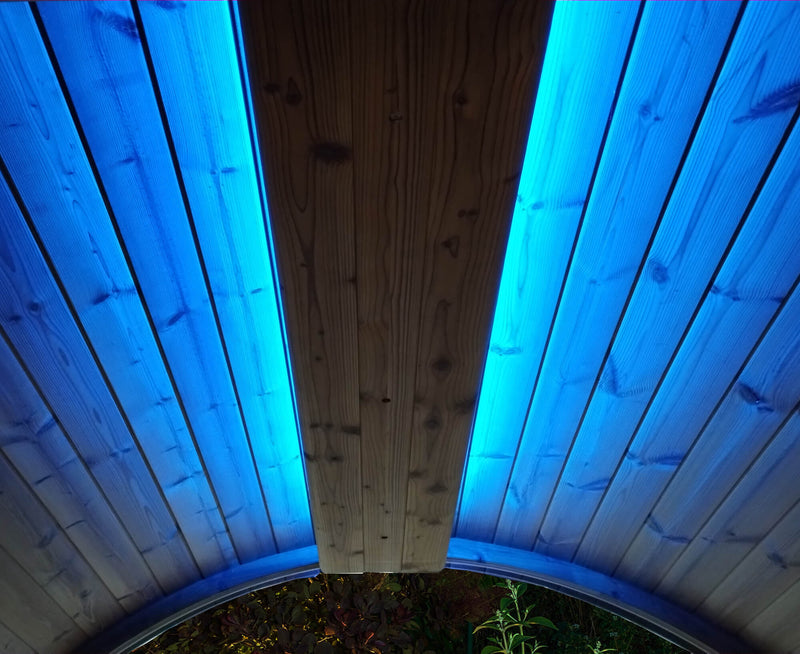 Wooden ceiling with blue LED lighting on the sides