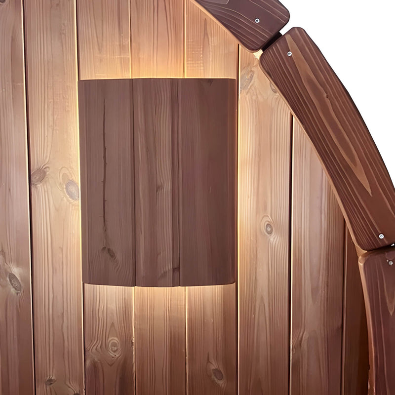 Wooden outdoor wall light fixture on a wooden wall