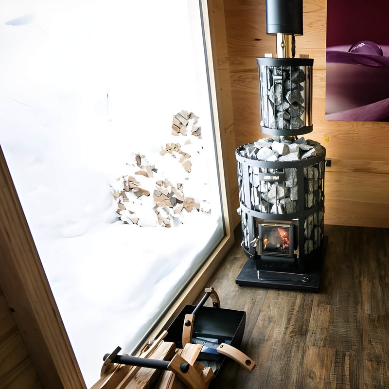 Wood-burning sauna heater next to a window with snow outside