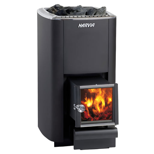 Black Harvia sauna heater with visible fire inside on a white background